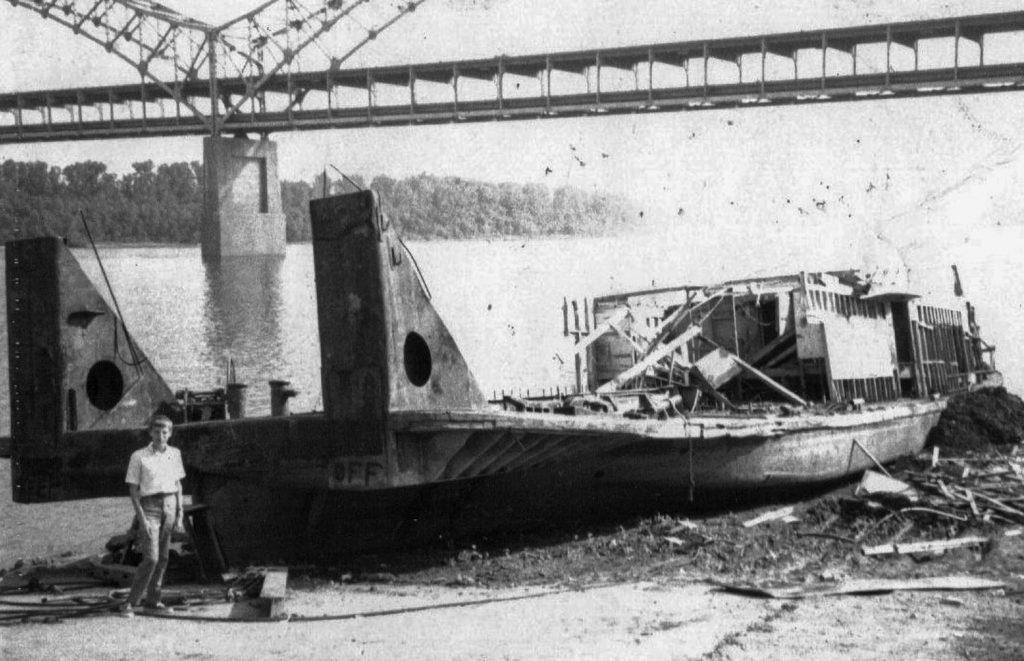 Remains of the Helen Z after the spring flood of 1970. The writer (age 16) is in the foreground. (Photo by Keith Norrington)