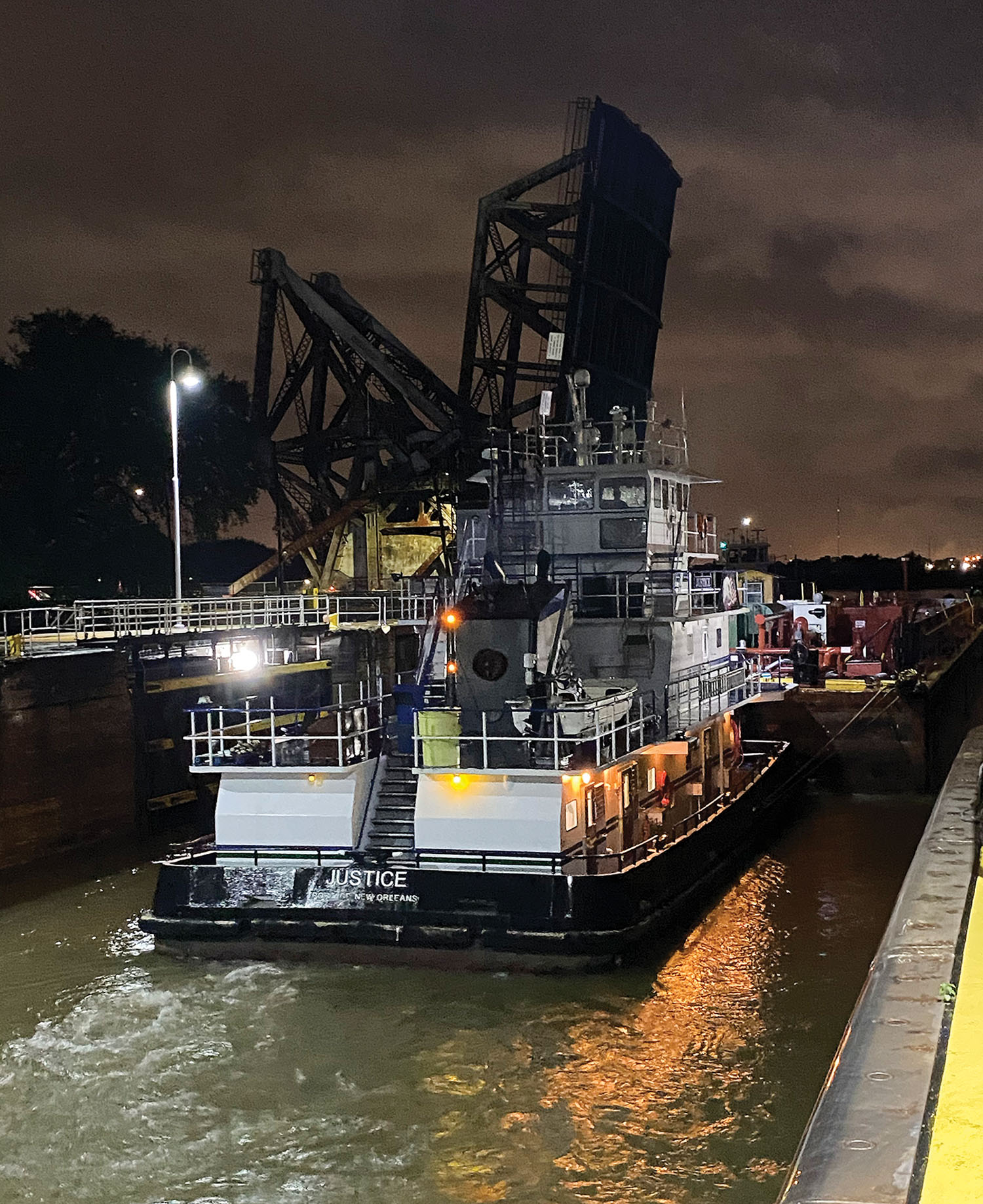 The mv. Justice was the first boat through the newly reopened IHNC Lock. (Photo courtesy of New Orleans Engineer District)