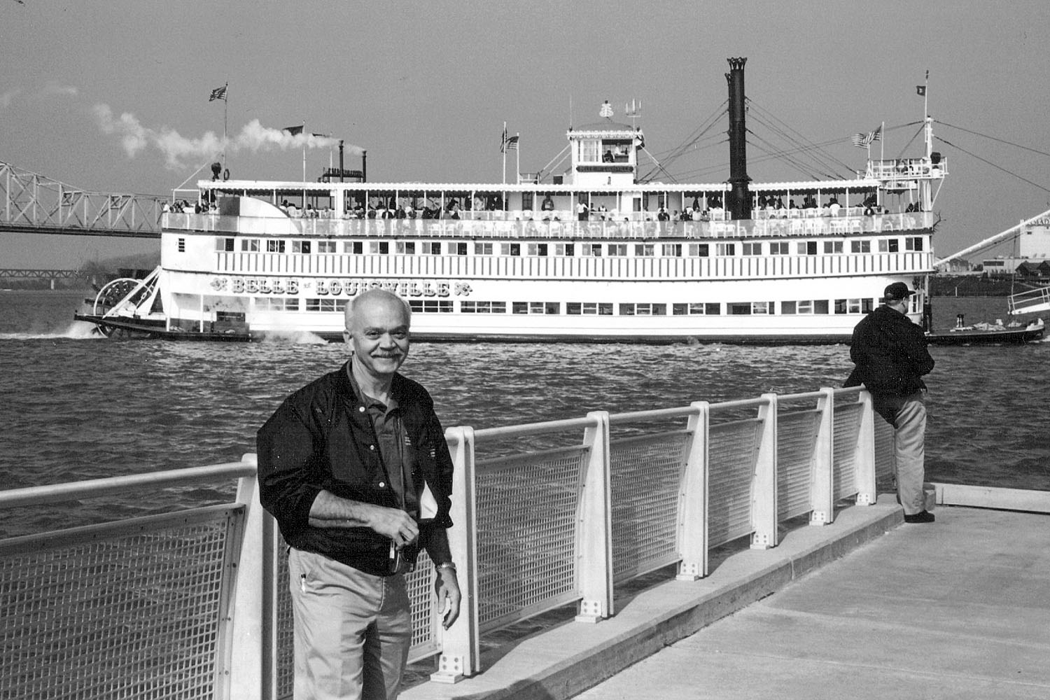 Chuck Parrish with the Str. Belle of Louisville passing in the background. (Keith Norrington collection)