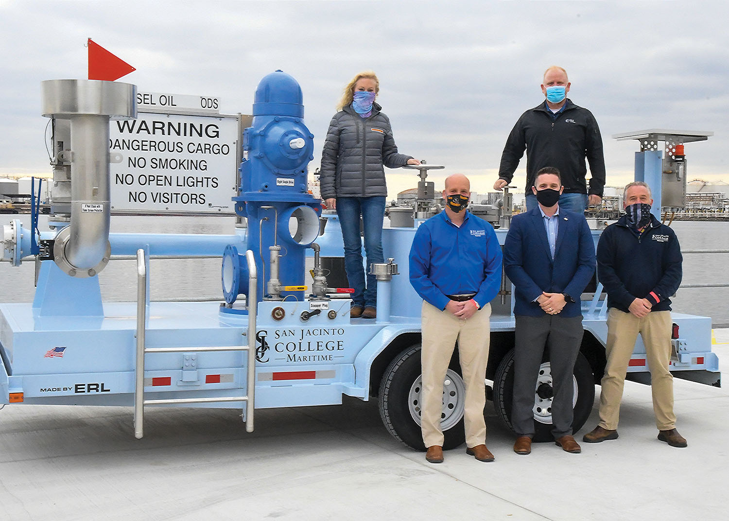 Representatives of San Jacinto College Maritime Technology & Training Center and ERL/Law Valve of Texas are pictured with the tank barge training trailer the company built for San Jac. Pictured are (top row, left to right) Amy Arrowood from San Jacinto College and Sean Ragains from ERL/Law Valve of Texas, and (front row, left to right) San Jac’s John Stauffer, Craig Theiler from ERL/LVT and San Jac’s Edward Horton.