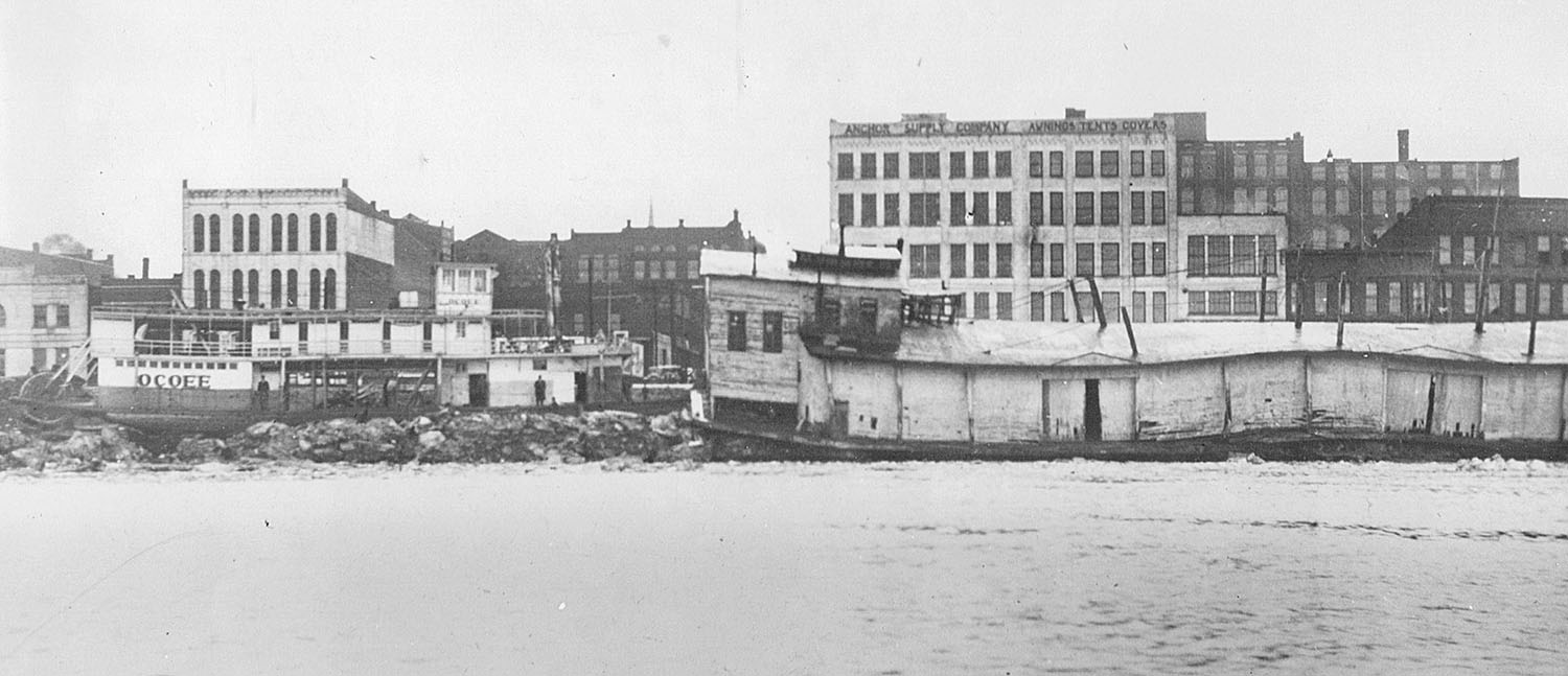 The steam towboat Ocoee and wharfboat after the 1936 ice gorge at Evansville, Ind. (Keith Norrington collection)