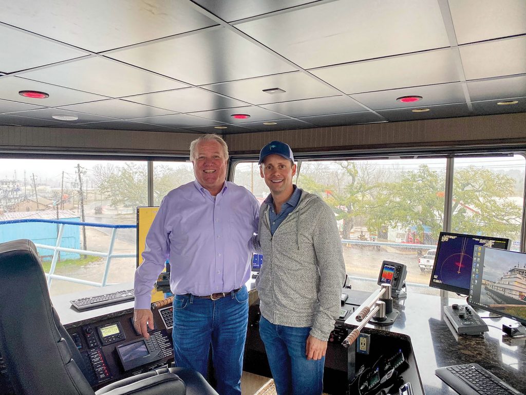 Richard Northcutt and Kent Furlong in the wheelhouse of the mv. Ron Nokes. 