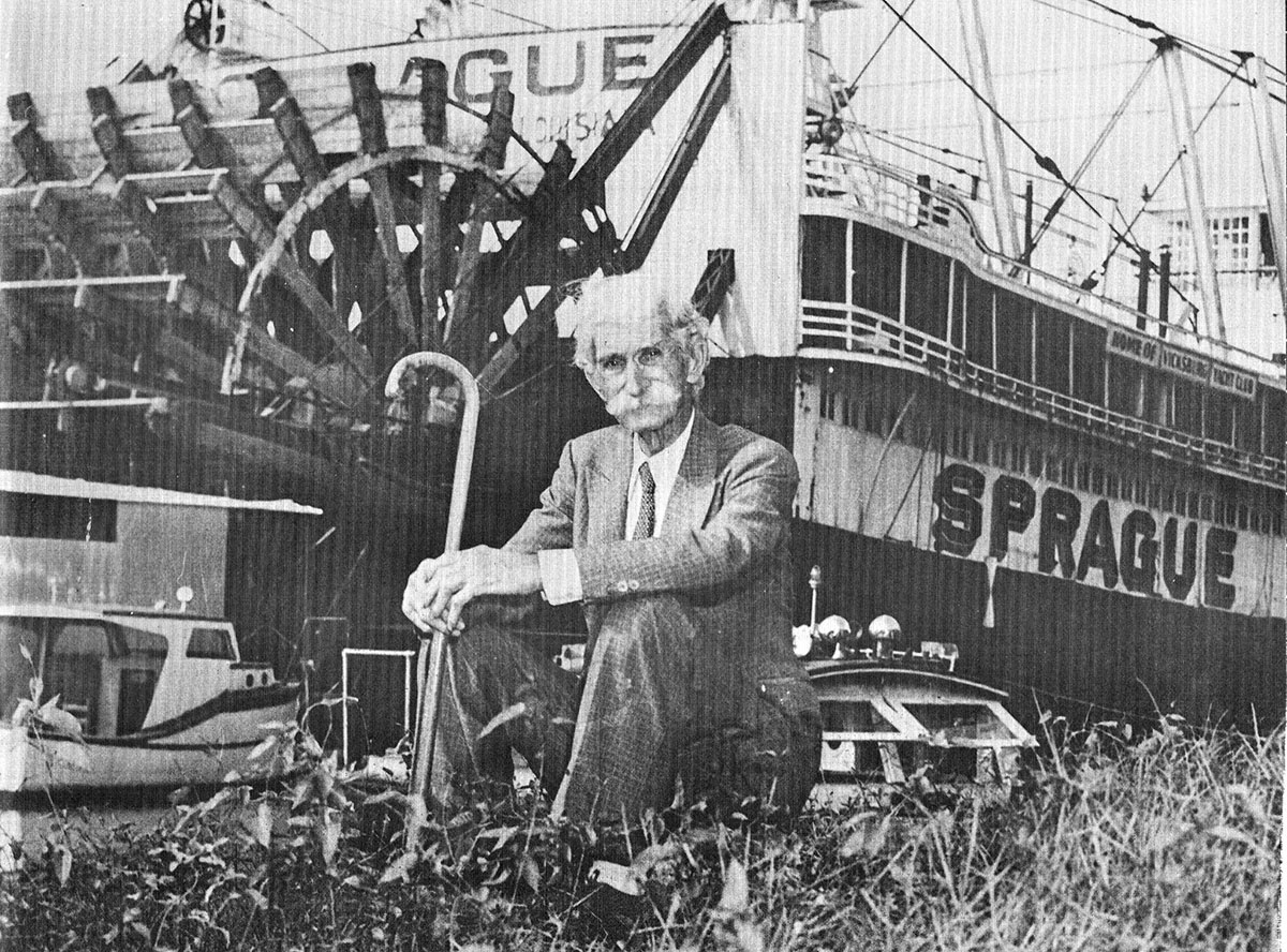 Photographer J. Mack Moore poses with the Str. Sprague on the Vicksburg waterfront in 1948. (Keith Norrington collection)