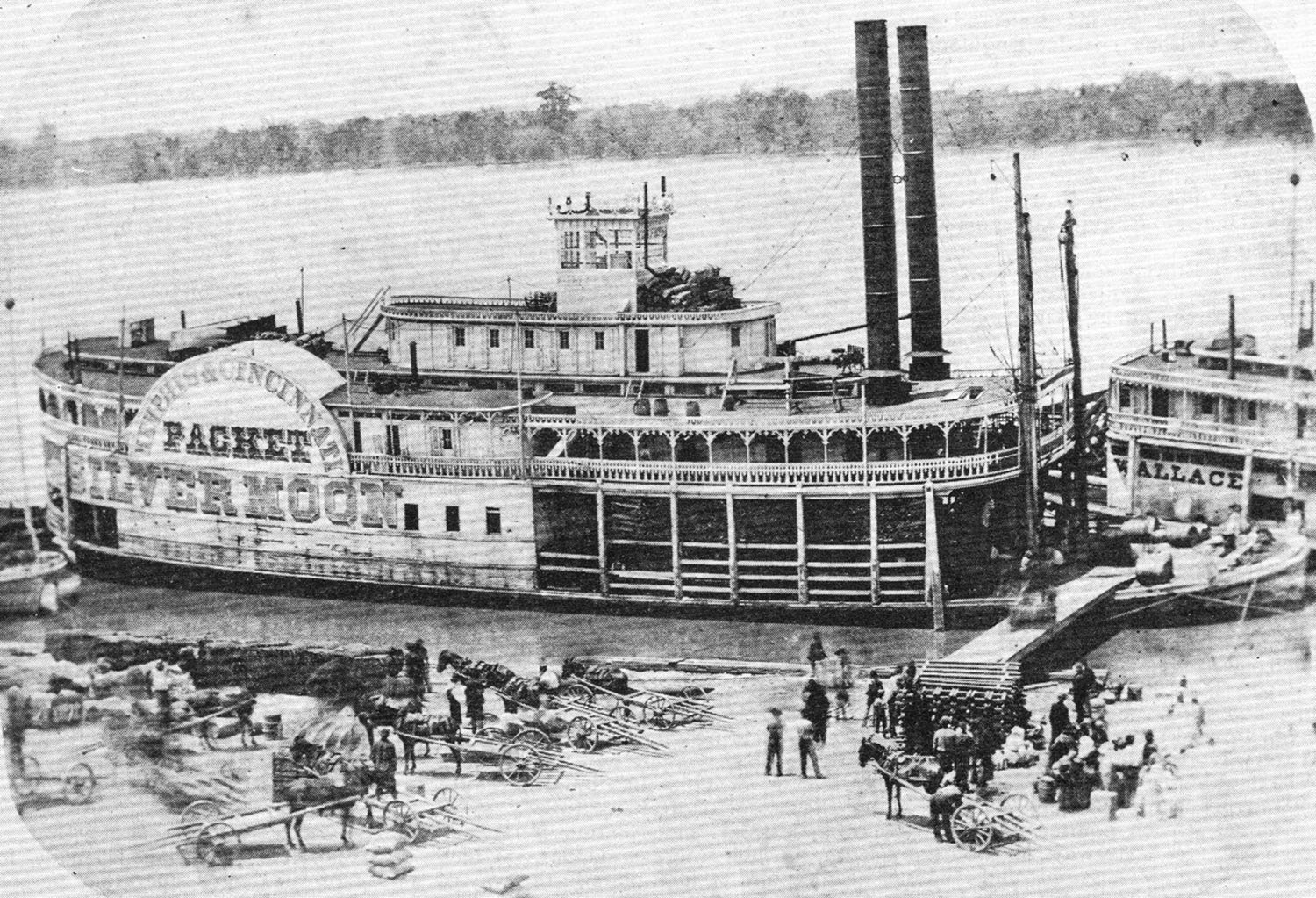 The Silver Moon at the Memphis wharf, alongside the sternwheeler Sir William Wallace. (Keith Norrington collection)