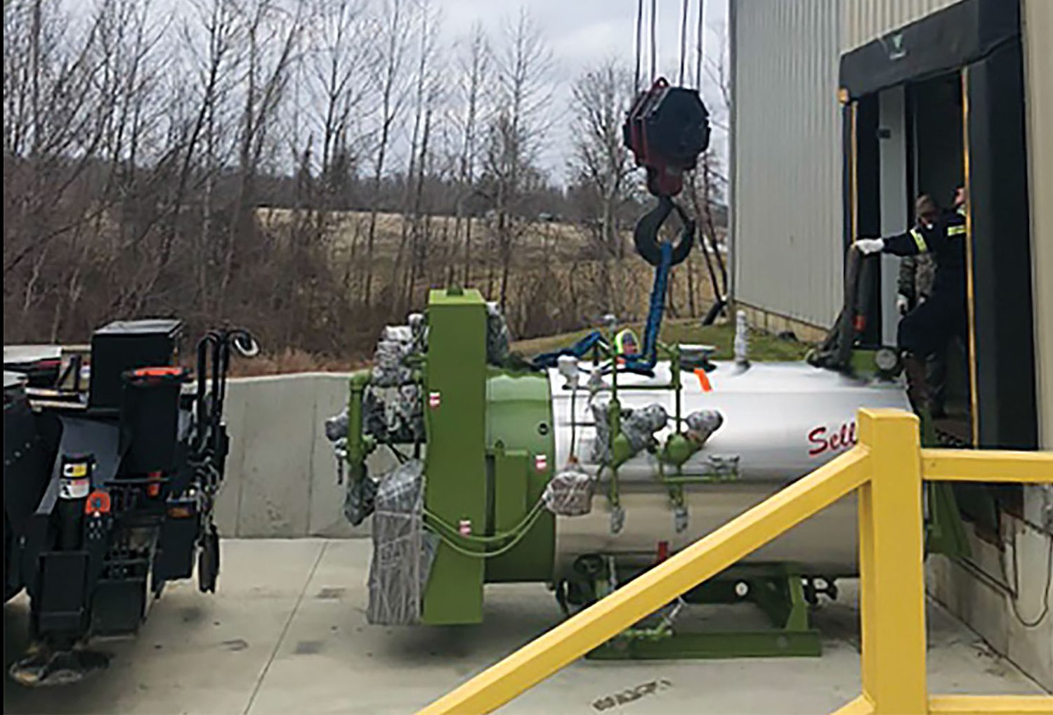 A boiler that will help turn Asian carp into fish meal for Novaland Group LLC arrives at Two Rivers Fisheries in Wickliffe, Ky. (Photo courtesy Ballard County judge-executive’s office)