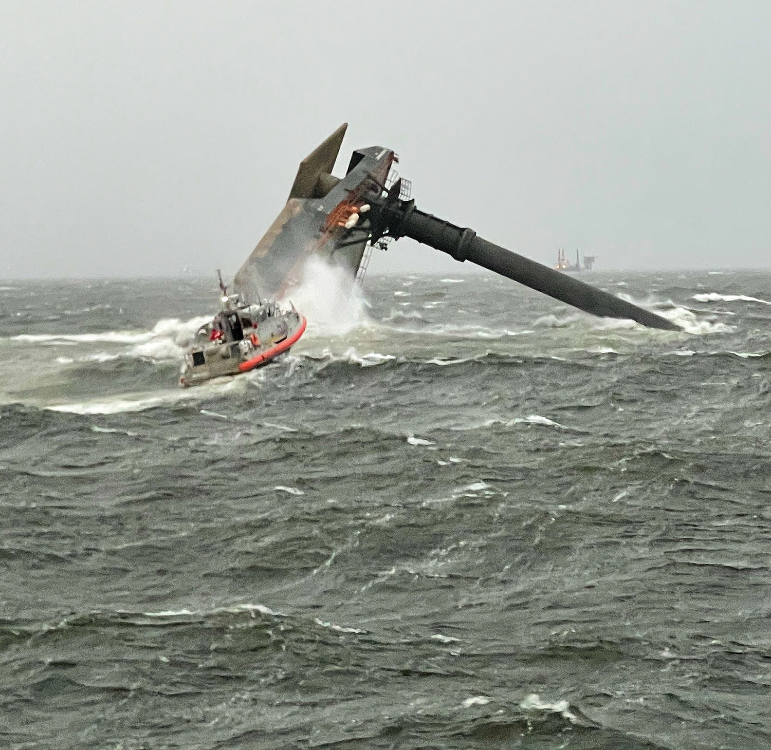 A Coast Guard Station Grand Isle 45-foot response boat-medium boat crew heads toward a capsized commerical lift boat April 13. The Coast Guard and multiple good Samaritan vessels responded to the capsized vessel and searched for multiple missing people in the water. (U.S. Coast Guard photo courtesy of Coast Guard Cutter Glenn Harris)