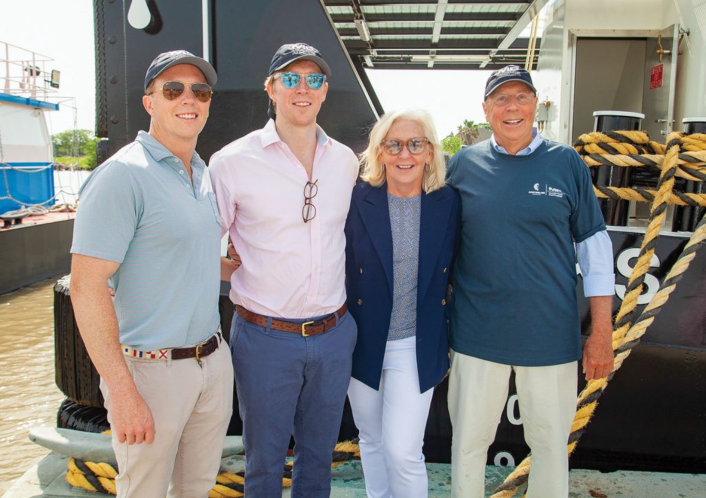 Members of the Brooks family, including (from left) Avery, Bick, Louise and Ned, stand beside the mv. Ned Brooks. (Photo by Frank McCormack)