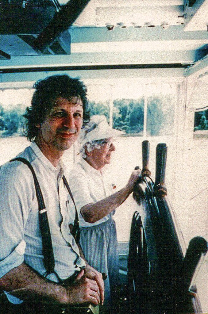 Capt. John Hartford and Ruth Ferris at the wheel of the Julia Belle Swain. (Photo by Dan Martin)