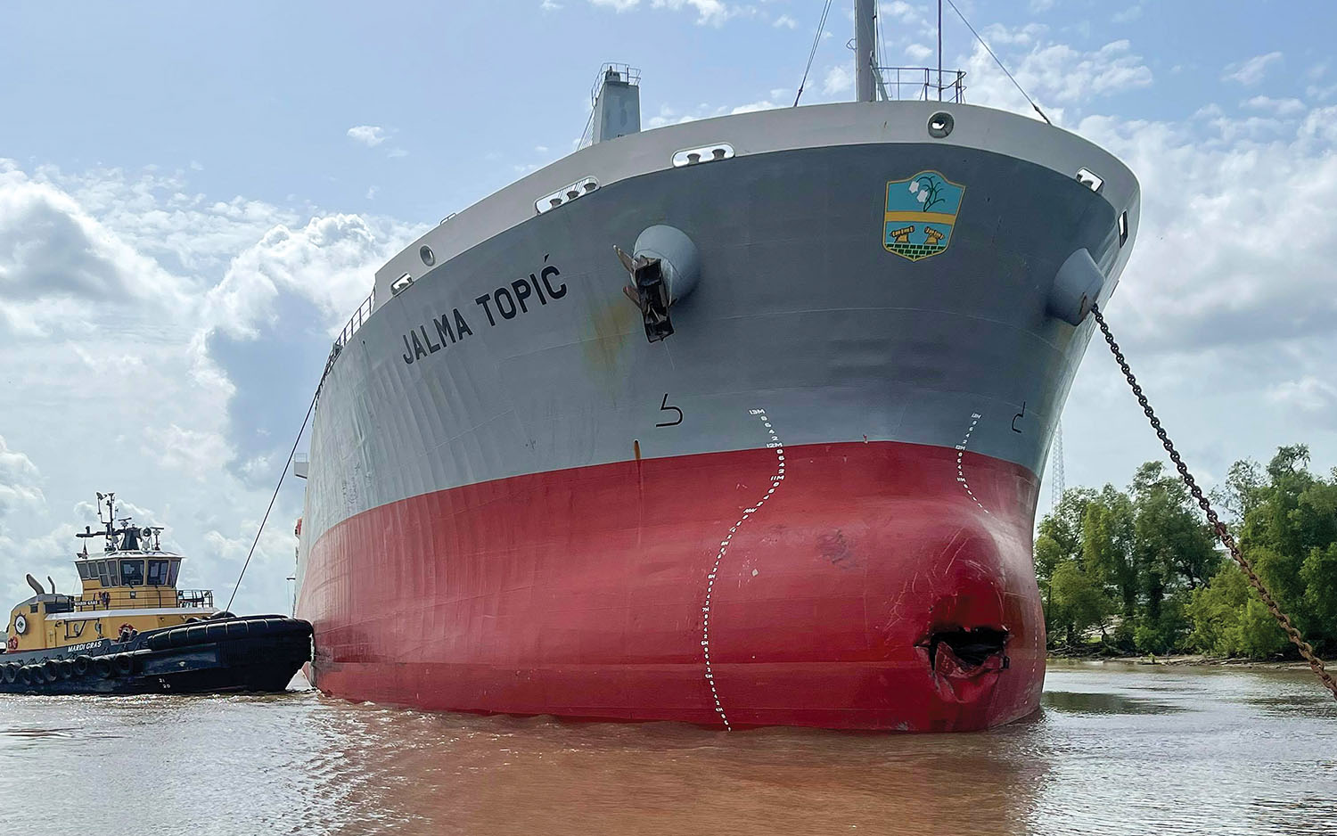 Ship Loses Steerage, Allides With Crescent Towing Office Barge