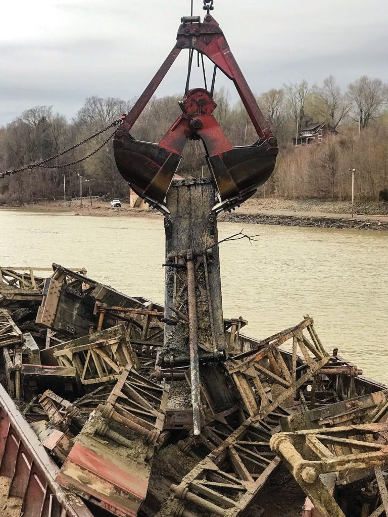 Wickets are removed from the former Dam 53 during early demolition stages in December 2019. (Photo courtesy Louisville Engineer District)