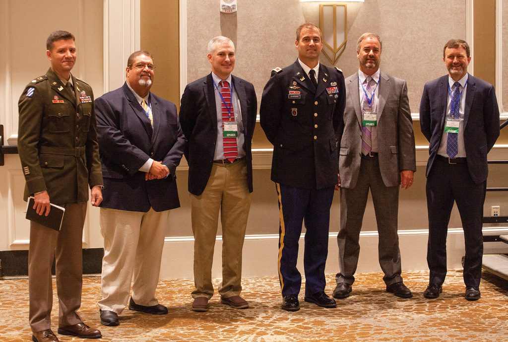 The Corps of Engineers team that spoke at the Tenn-Tom conference, including (left to right) Lt. Col. Joe Sahl, commander of the Nashville District; Nelson Sanchez, operations division chief for the Mobile District; Adam Walker, project manager for the Kentucky Lock Addition Project; Col. Jeremy Chapman, commander of Mobile District; Justin Murphree, operations manager for the Tenn-Tom Waterway; and Anthony Perkins, operations manager for the Black Warrior-Tombigbee Waterway. (Photo by Frank McCormack)