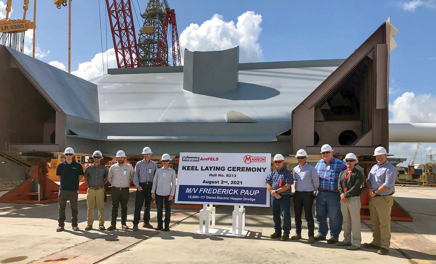 Officials from Manson Construction Company and Keppel AmFELS commemorate the keel-laying for the Frederick Paup.