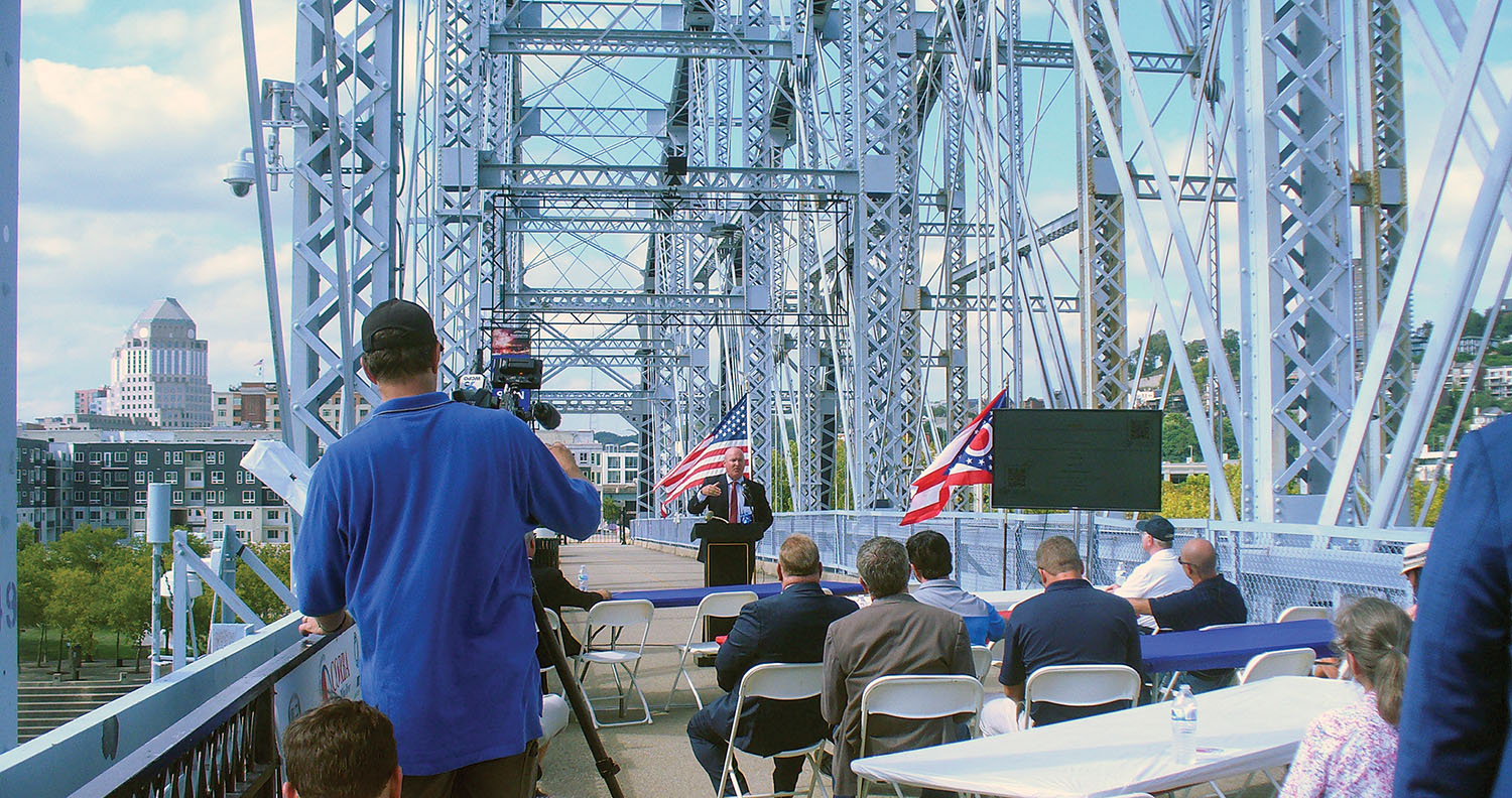 CORBA Chairman Scott James speaks during celebration on Purple People Bridge over the Ohio River. (Photo by Christi Kleiner)