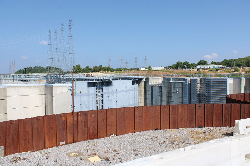 An access road temporarily blocks the newly constructed upstream miter gates for the Kentucky Lock Addition Project. (Photo by Shelley Byrne)