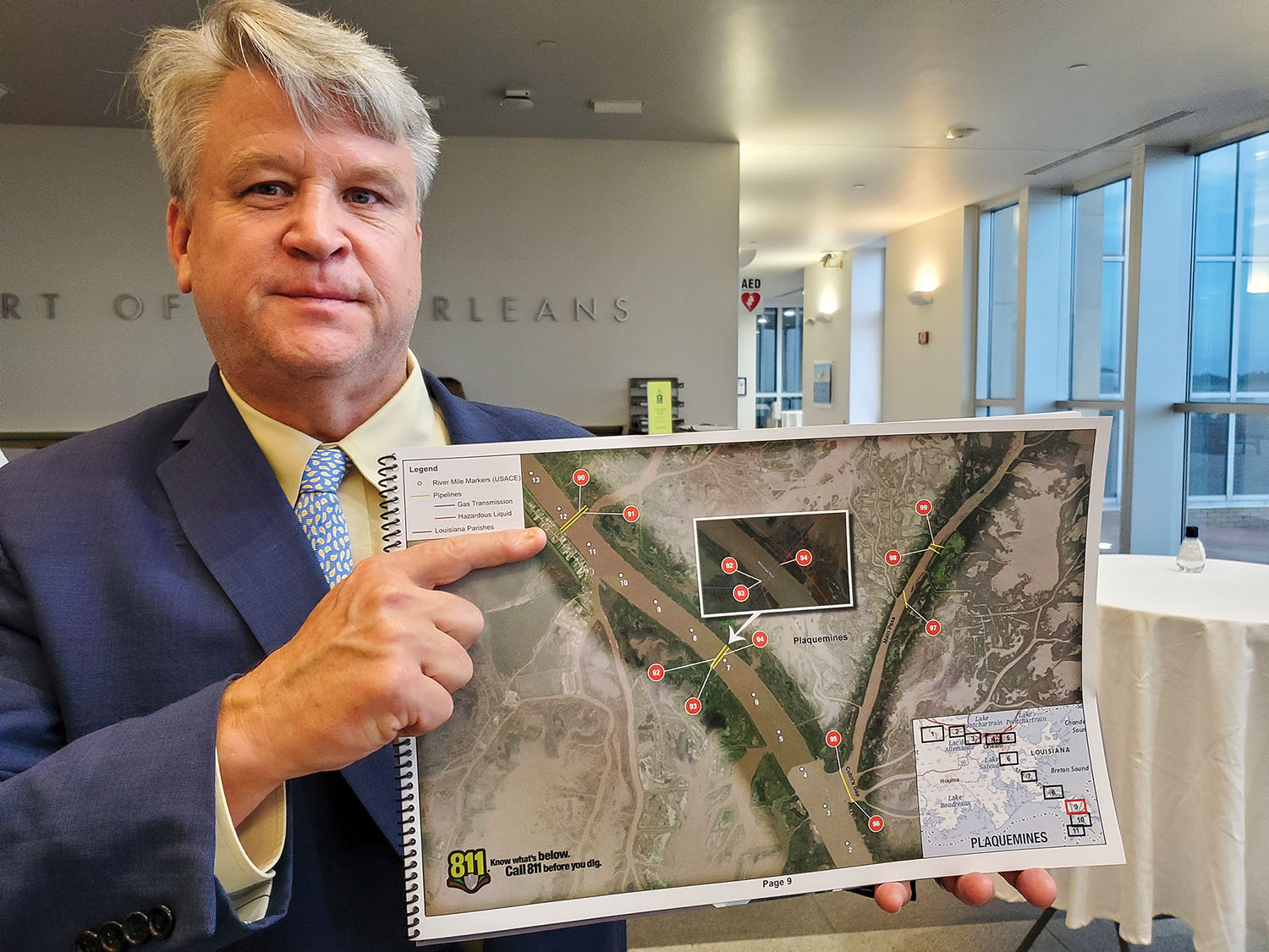 Sean Duffy with the Lower Mississippi River Pipeline Identification Guide. (Photo by Richard Eberhardt)