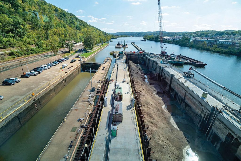 The new lock chamber (right) is emptied of water next to an older and smaller chamber at Charleroi Locks and Dam. Photo by Michel Sauret/Pittsburgh Engineer District)