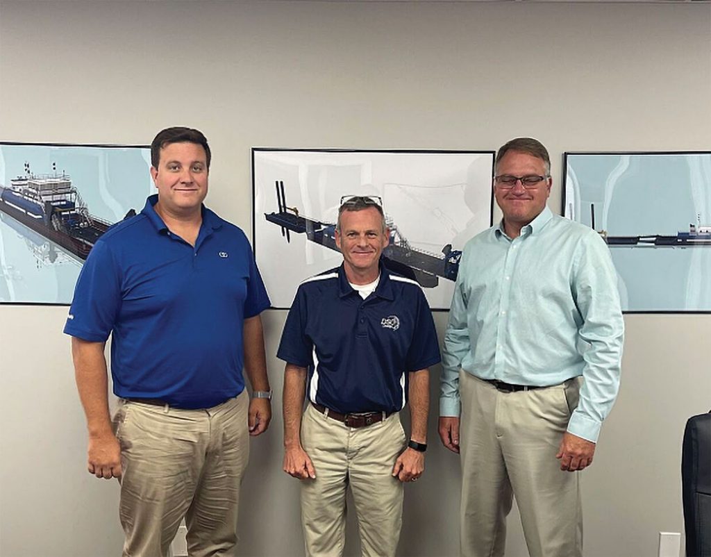 From left, Matthew Devall, co-owner and director of Muddy Water Dredging; Bob Wetta, president and CEO of DSC Dredge; and Michael Kerns, co-owner and president of Muddy Water Dredging. (photo courtesy of DSC Dredge)