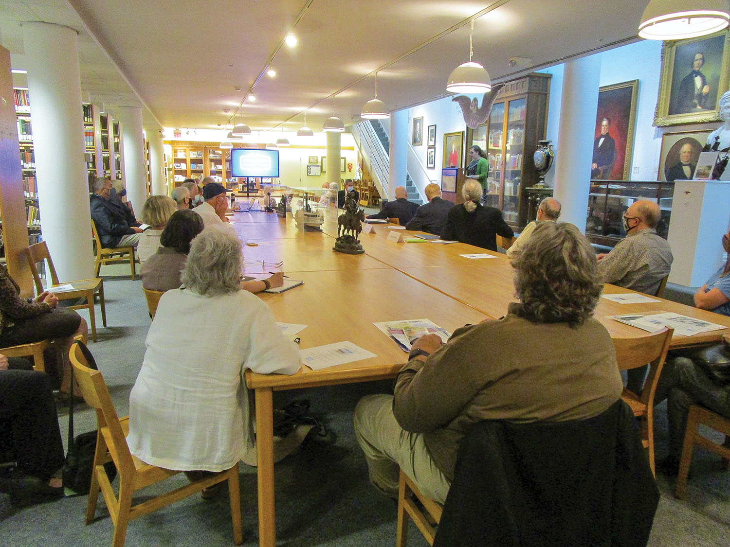 Sara Hodge, curator of the Herman T. Pott National Inland Waterways Library, presents a tribute to longtime Waterways Journal editor and publisher Donald Wright. (Photo by Brittney West)