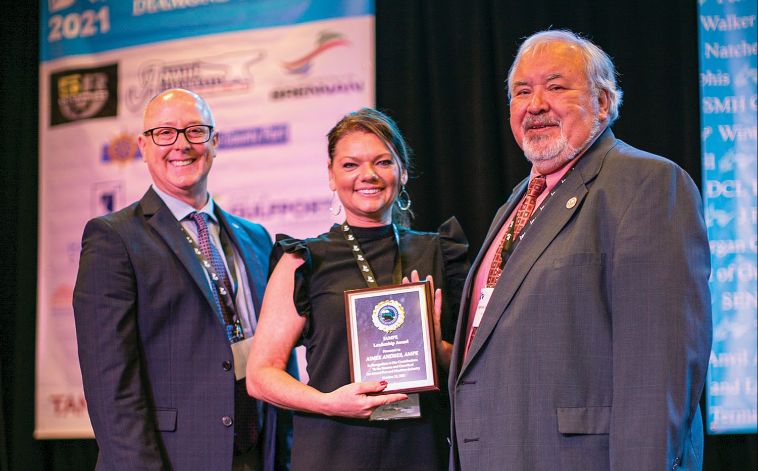 Pictured are Dr. Donald Maier, dean of Maritime Transportation, Logistics and Management at California State Maritime University, Aimee Andres and Capt. Jeffrey Monroe presenting the award at the recent annual IRPT Conference in Biloxi, Miss.