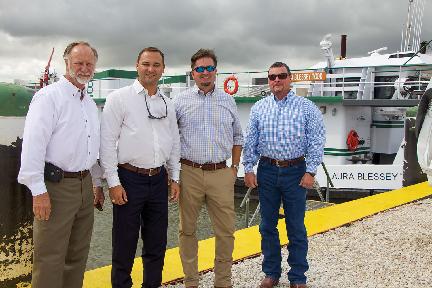 Ron and Kurt Moerbe with project managers Ben Pate and Wes Broussard. (Photo by Nelson Spencer Jr.)