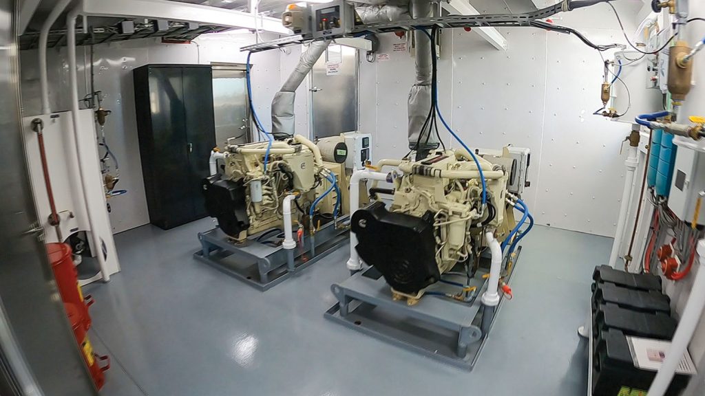Cummins generators are controlled by a paralleling, auto-start switchboard. (Photo courtesy of Steiner Construction Company)