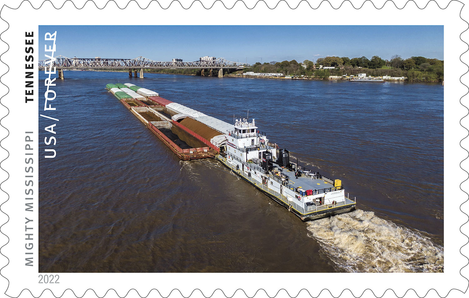 The Mighty Mississippi stamp for Tennessee includes an image of a towboat pushing barges. (Image courtesy of U.S. Postal Service)
