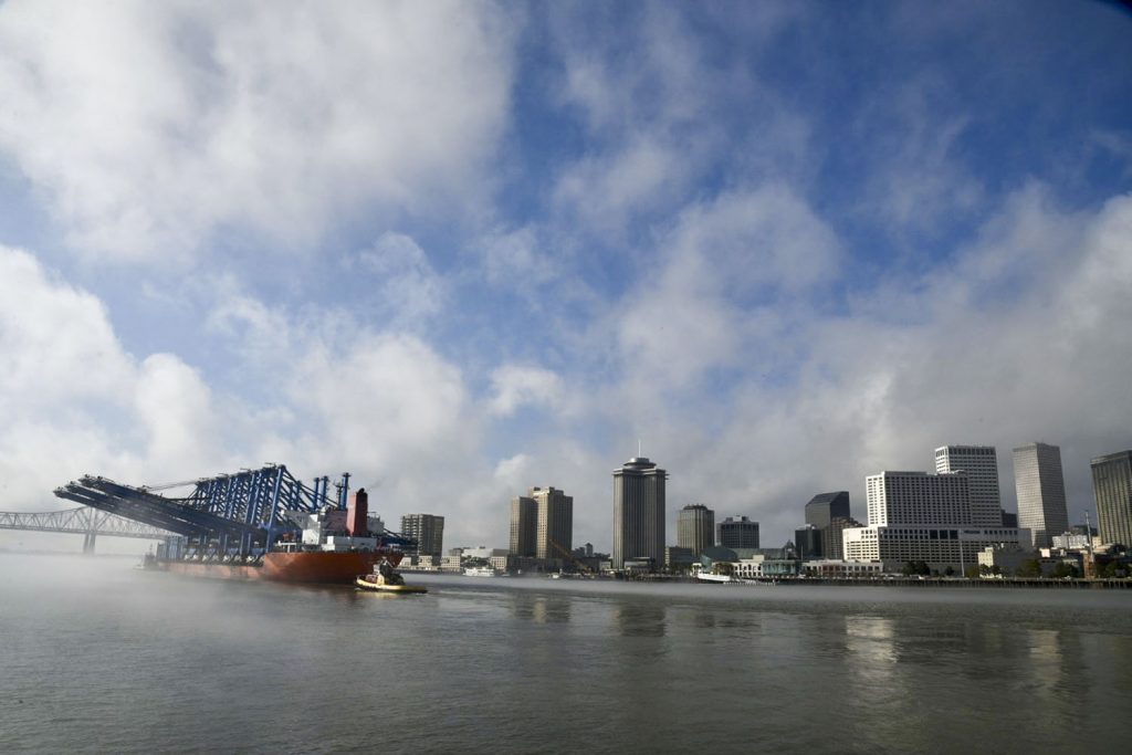 New cranes transiting the Mississippi River December 10 as they traveled to the Napoleon Ave. Container Terminal. (Photo courtesy of Port NOLA)