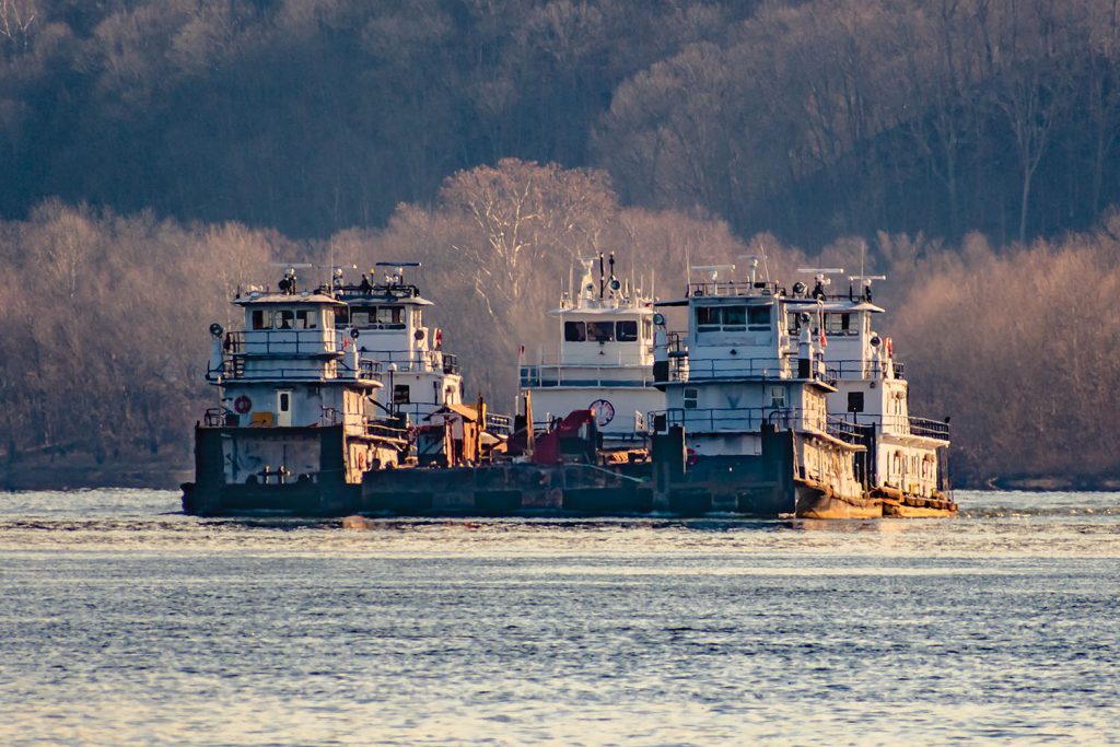 This flotilla of four towboats pushed by a fifth boat was seen on the upper Ohio River near Glenwood, W.Va., January 23. The mv. L. Dale Manns of Superior Marine Inc. towed four boats Superior had recently acquired from Ohio River Salvage Company from Pittsburgh to South Point, Ohio. The four boats being towed were the Bill Stile, D.A. Grimm, Myra H and Connie K. (Photo by Jeff Cumptan)
