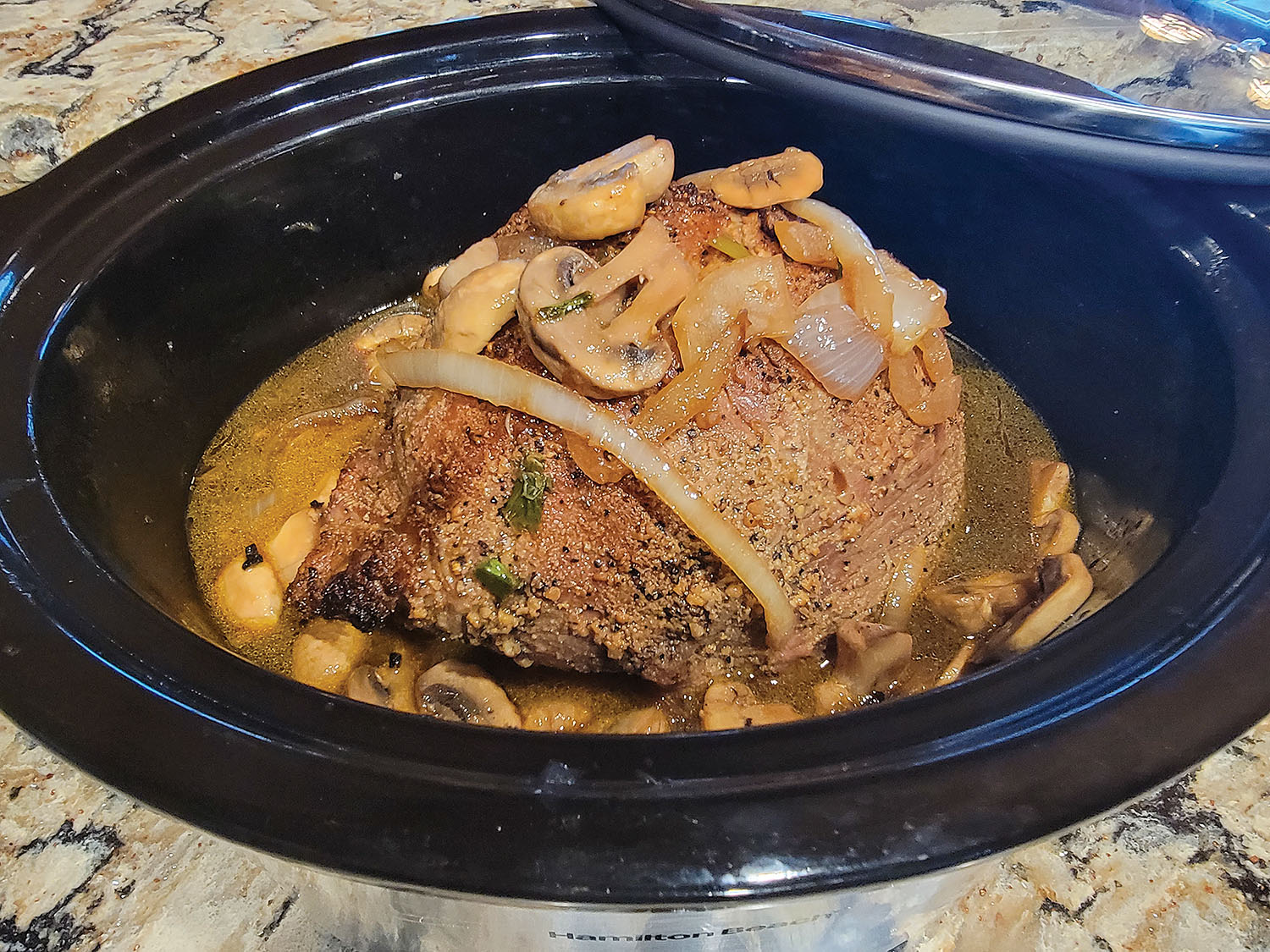 Slow cooker beef roast with mushroom gravy.