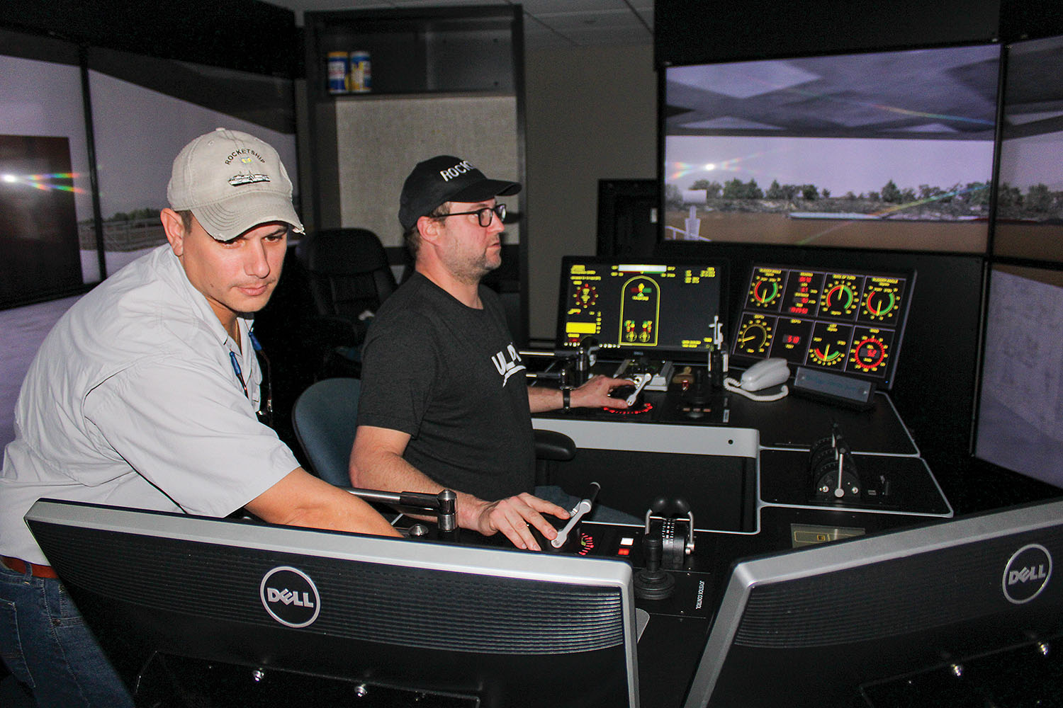 Capt. Tom Sullivan (left) and third mate Mike Cooper complete a simulation in which Cooper piloted the R/S RocketShip down the Lower Mississippi River near Baton Rouge, La. (Photo by Shelley Byrne)
