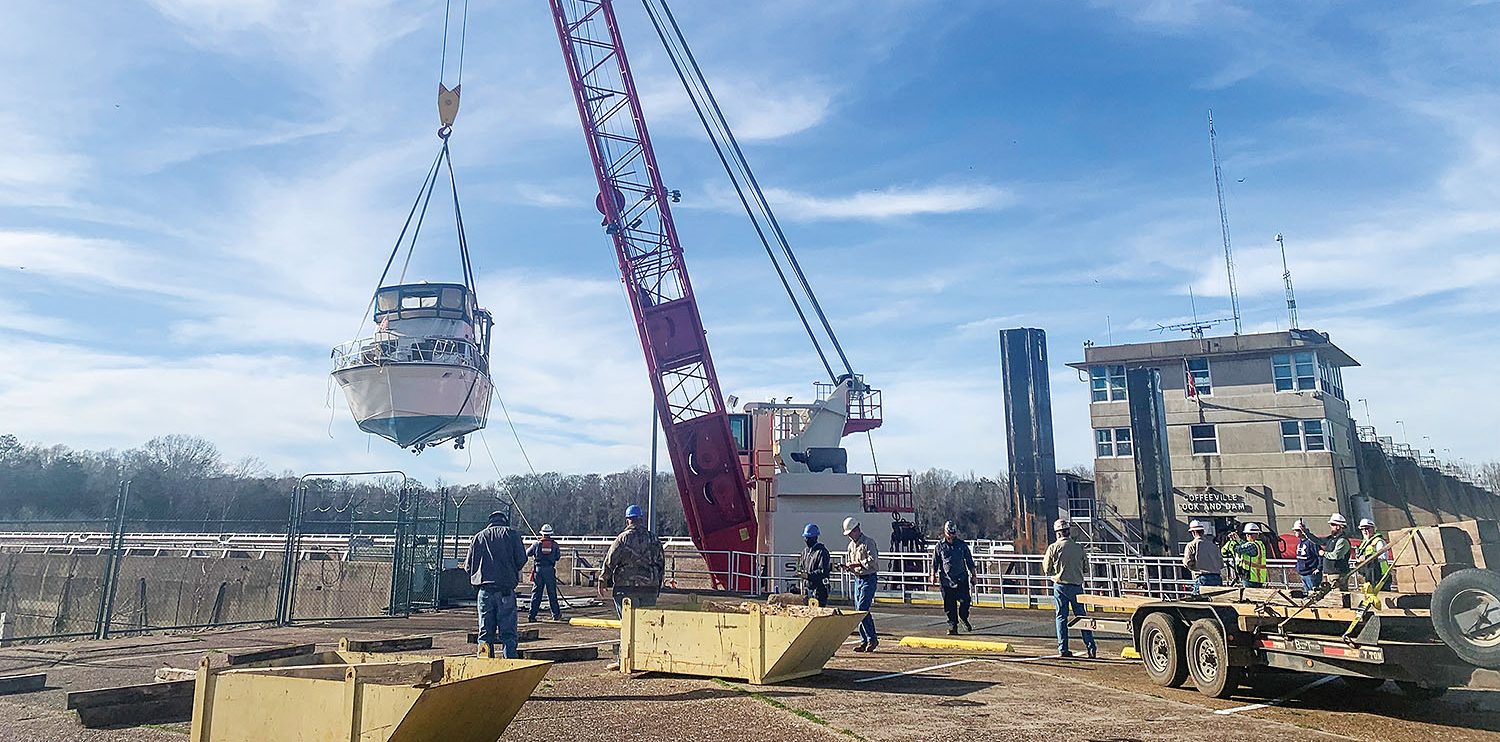 A 41-foot recreational vessel is removed from the Coffeeville Lock January 14. (Photo courtesy of Mobile Engineer District)