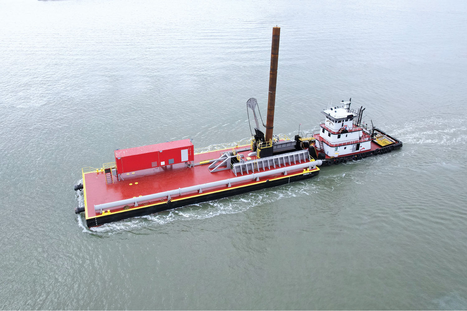 The idler barge Jeremiah H was built by Southwest Shipyard and SPI/Mobile Pulley Works.