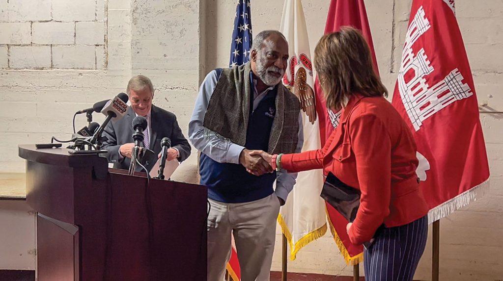 From left: Sen. Dick Durbin, Del Wilkins and Rep. Cheri Bustos. (Photo by Paul Rohde)