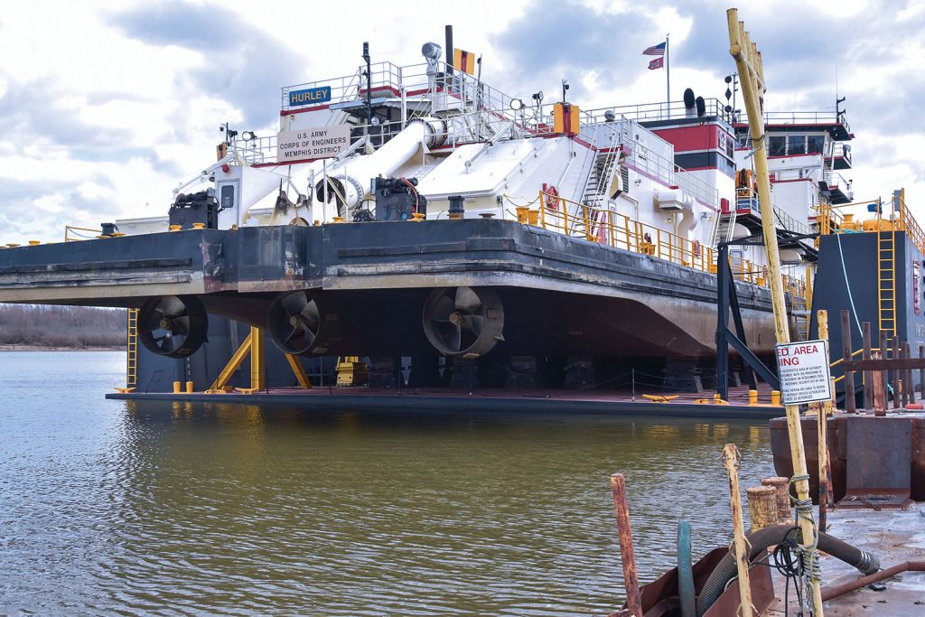 The largest dustpan dredge in the Army Corps fleet, the 349-foot-long Dredge Hurley, undergoes routine maintenance for three weeks in early 2022 on Ensley Engineer Yard’s 3,200-ton drydock. (Photo by Bobby Petty)