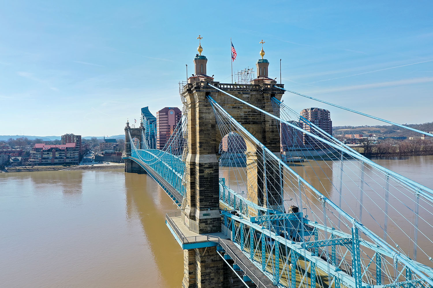 The John A. Roebling Bridge, a suspension bridge crossing the Ohio River between Cincinnati, Ohio, and Covington, Ky., opened in 1867. It is expected to reopen this spring following completion of repairs that have kept it closed to vehicle traffic for more than a year. (Photo by Nancy Wood/Kentucky Transportation Cabinet)