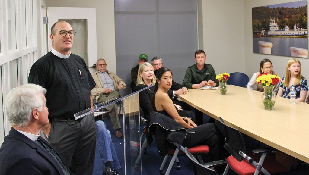 The Rev. Tom Rhoades served as master of ceremonies. (Photo by Shelley Byrne)