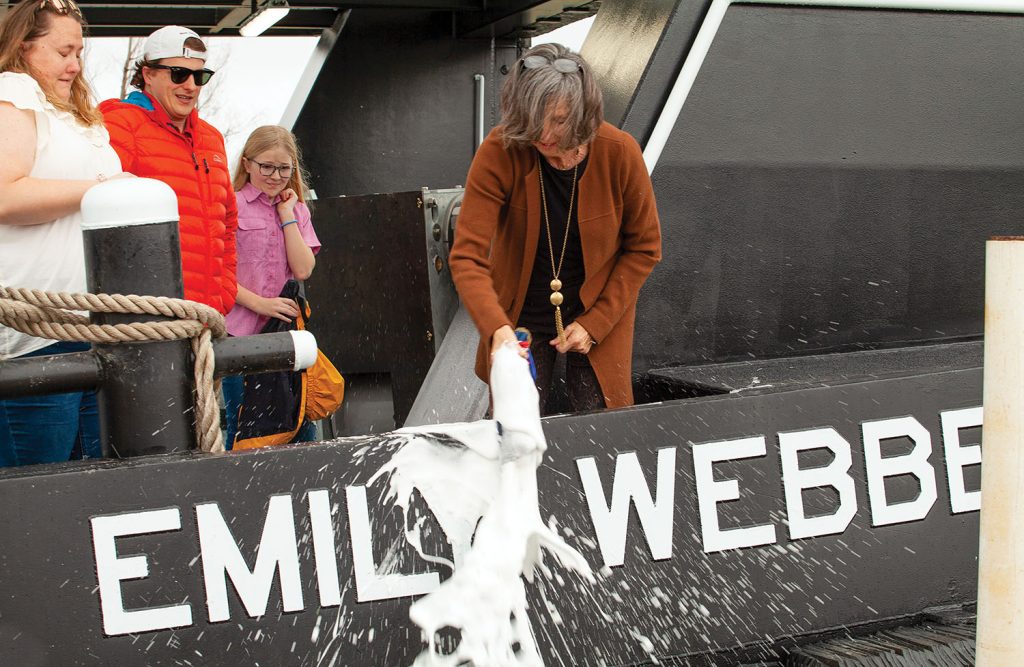 Retia Webber christens the mv. Emily Webber, named after her daughter, who died last year. (Photo by Frank McCormack)