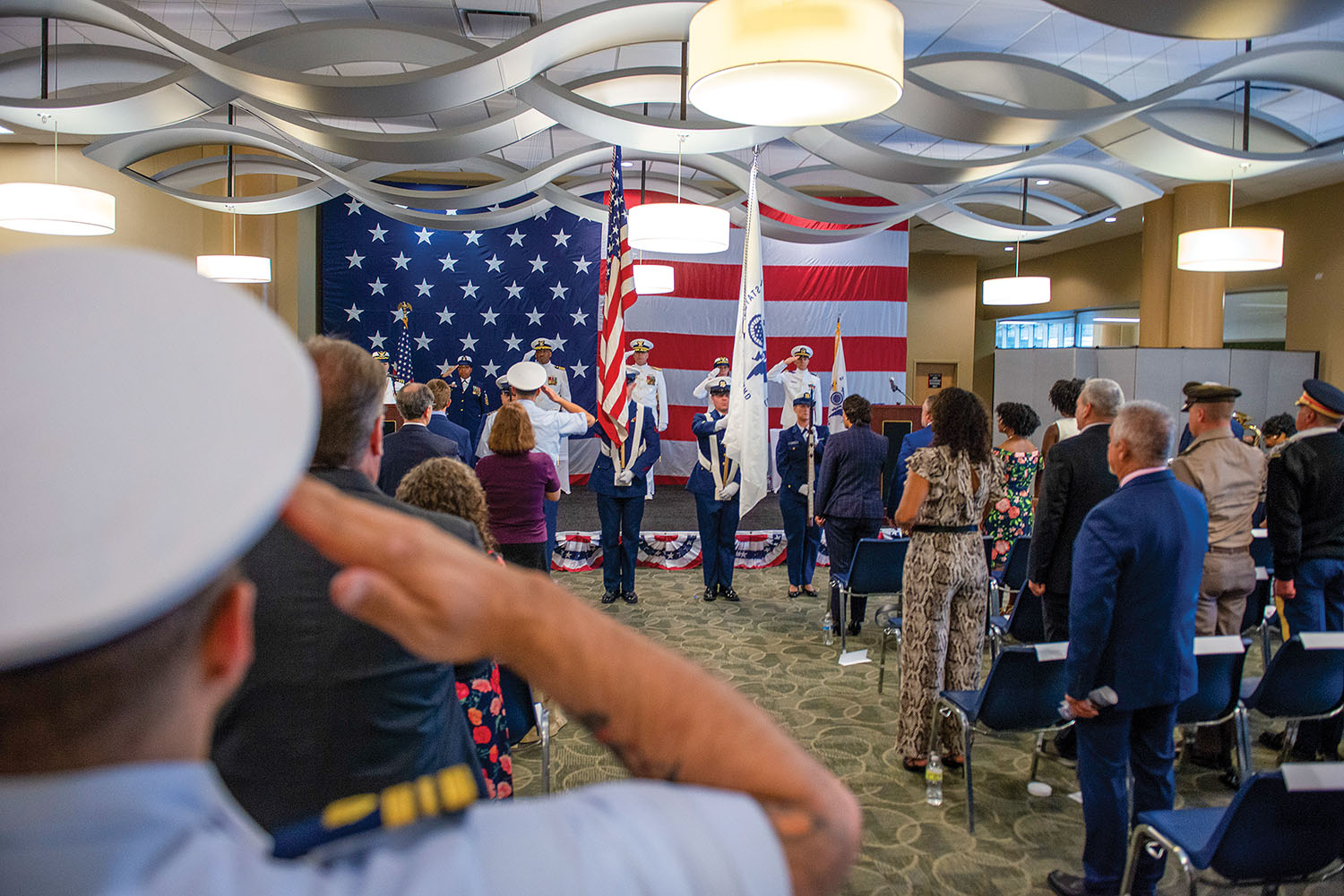 Caption for top photo: The color guard presenting the colors for the Coast Guard Sector New Orleans change of command ceremony April 14. (U.S. Coast Guard photo by PA3 Riley Perkofski)