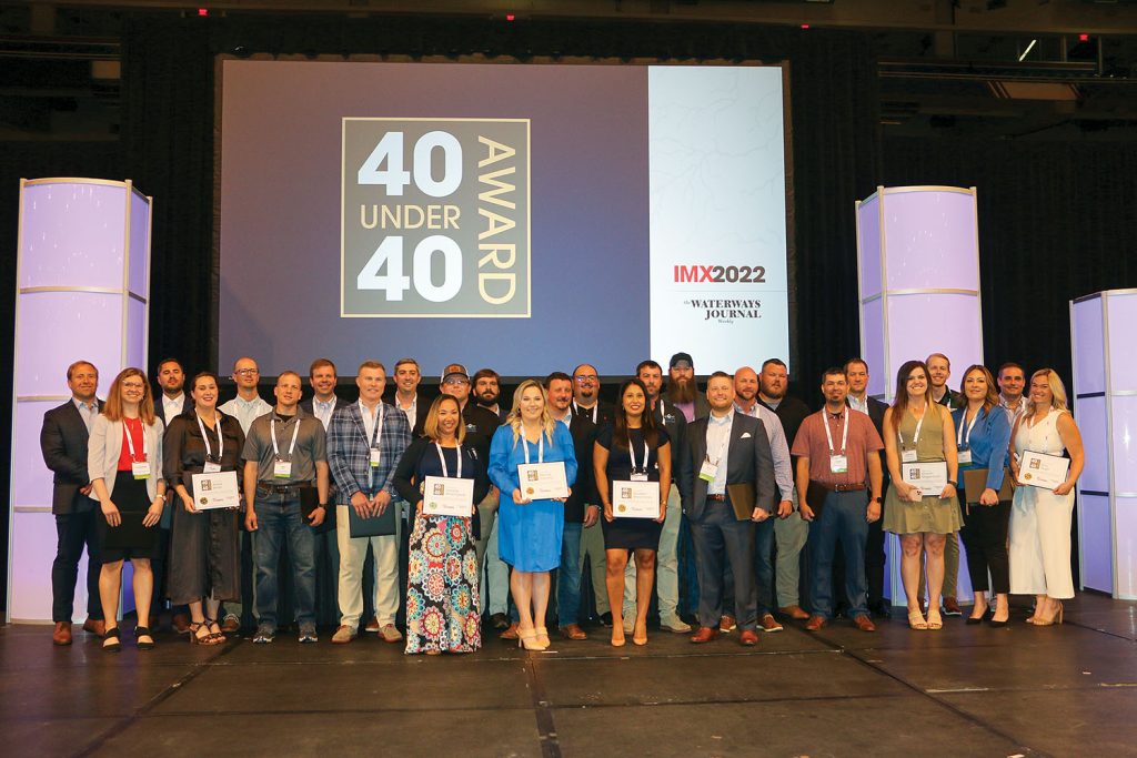 This year’s recipients of the 40 Under 40 Award gather for a group photo following the awards ceremony. The honorees will be featured in the pages of the WJ over the next few weeks. (Photo by John Shoulberg)