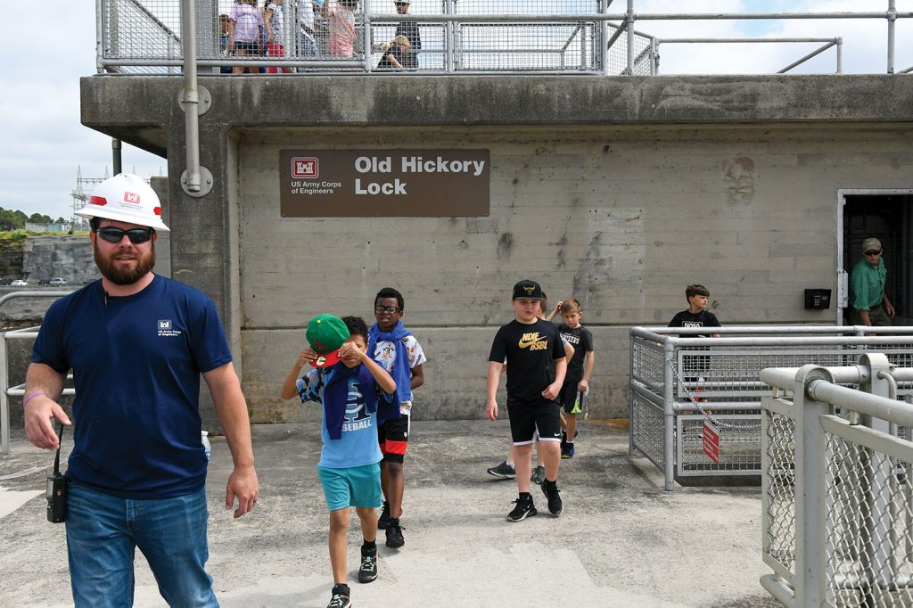 Old Hickory Lock and Dam Equipment Mechanic Supervisor Justin Gray walked Union Elementary STEAM students to the lock, where they watched the gates open and asked questions about daily lock operations. (Photo by Misty Cunningham)