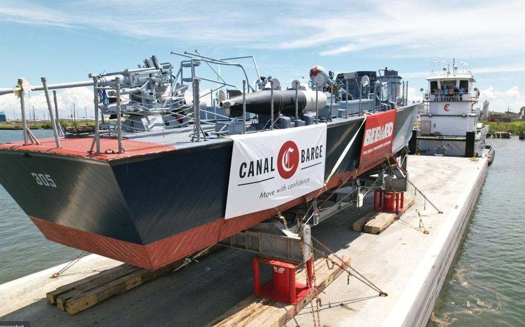 Berard Transportation and Canal Barge Company were two of the companies involved with moving PT-305, a World War II-era “patrol torpedo” vessel, from Seabrook Harbor near Lake Pontchartrain to the riverfront in downtown New Orleans on July 7. The vessel has since been moved to the National WWII Museum. (Photo courtesy of Canal Barge Company)