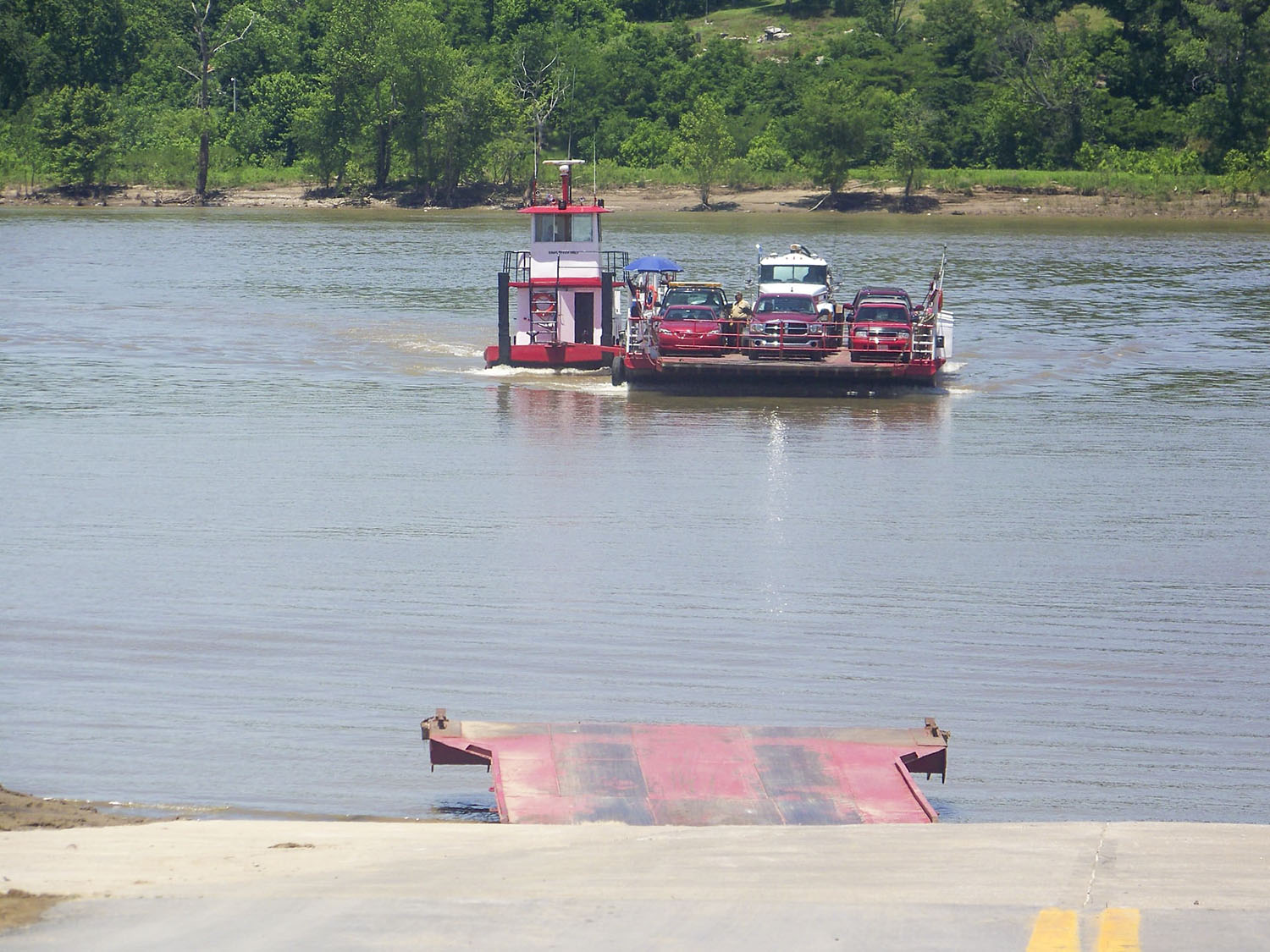 Cars cross the Ohio River on the Cave-in-Rock Ferry at Mile 881. The ferry will continue operations after, for the second time in a row, negotiations for the two-year contract came down to the last planned day of service. (Photo courtesy of the Kentucky Transportation Cabinet)