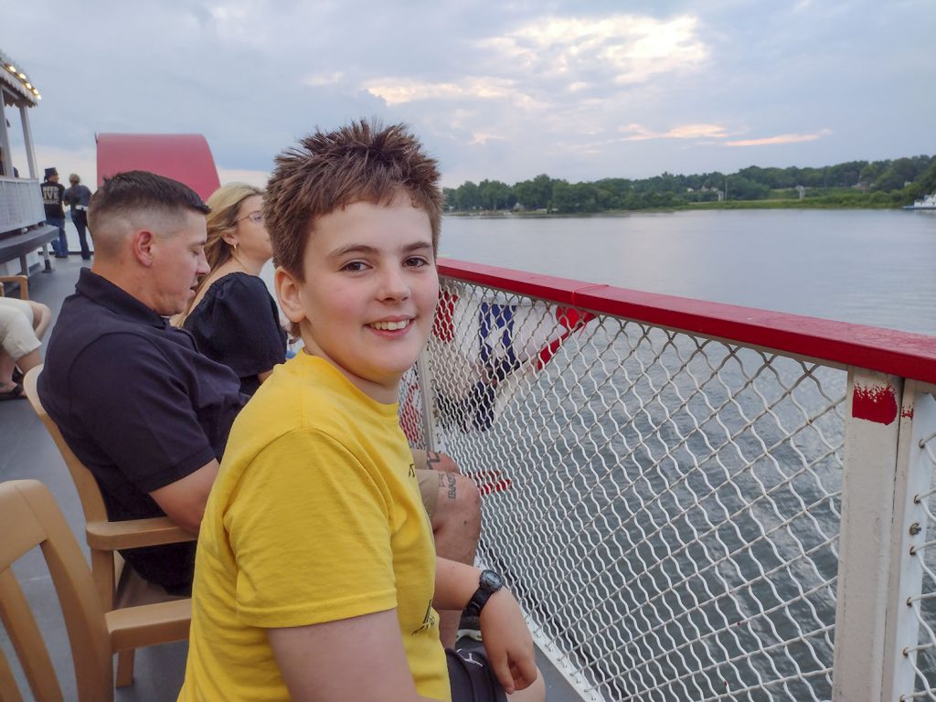 Drew Byrne, 12, enjoys a sunset trip on the Belle of Louisville from the hurricane deck. (Photo by Shelley Byrne)