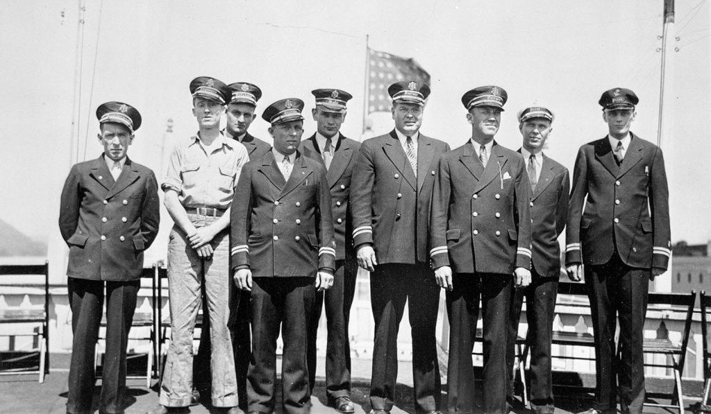 Washington officers in the mid 1930s: fourth from left is Capt. Edgar Mabrey, master; next to him are Capt. T. Kent Booth, mate, and Capt. C.W. “Heavy” Elder, purser; second from right is Capt. Frederick Way Jr.; and at far right is Capt. William S. Pollock. The identities of the others are unknown. (David Smith collection)