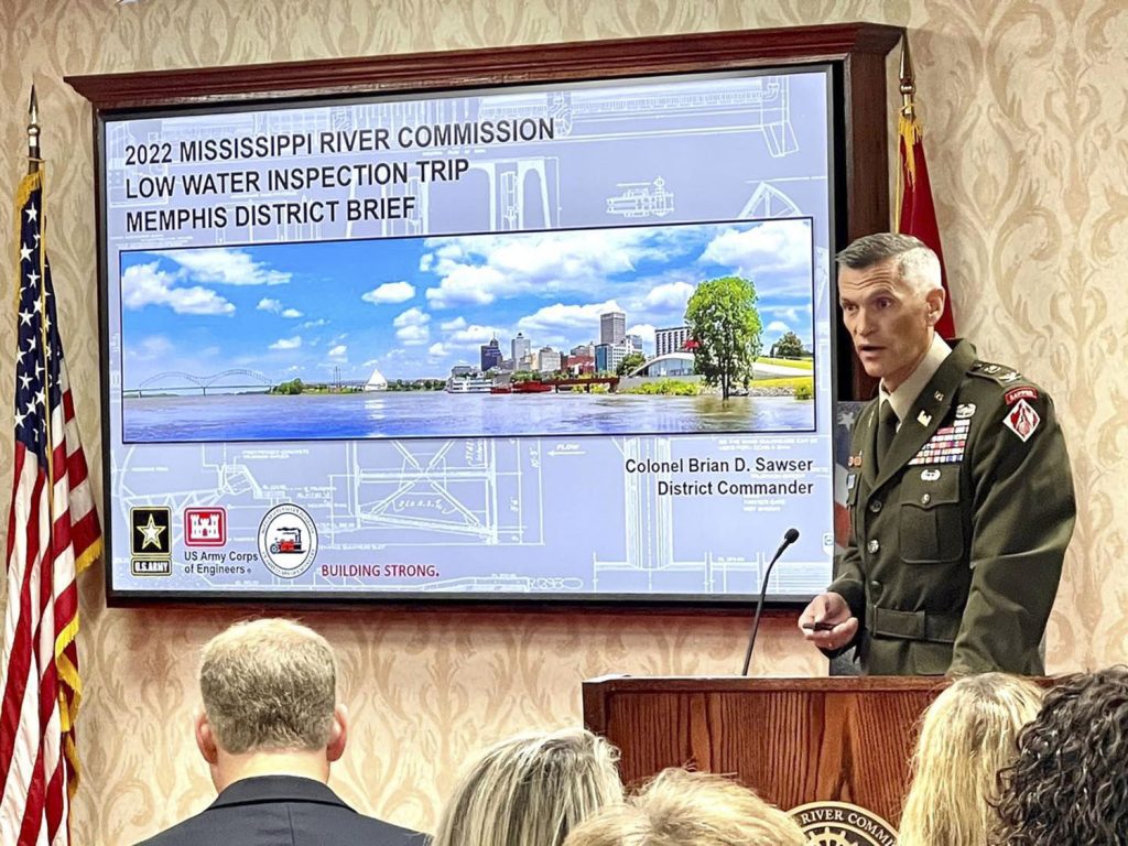 Col. Brian Sawser, commander of the Memphis Engineer District, briefs those attending one of the Mississippi River Commission’s public hearings on board the mv. Mississippi. (Photo by VI Specialist Vance Harris)