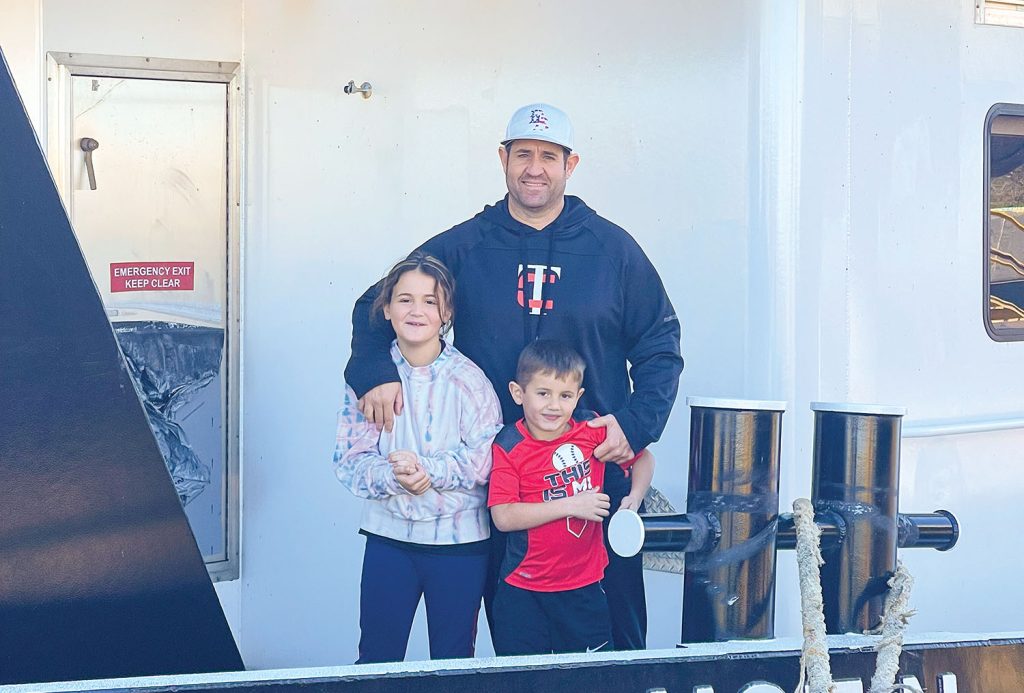 Austin Sperry, Maritime Partners co-founder and chief operating officer, with his daughter Genevieve and son John. (Photo courtesy of Maritime Partners)