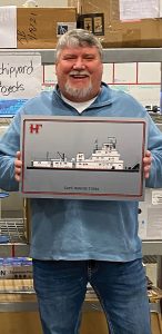 Vessel namesake Capt. Reggie Tubbs with commemorative plaque. (Photo courtesy of Hines Furlong Line)