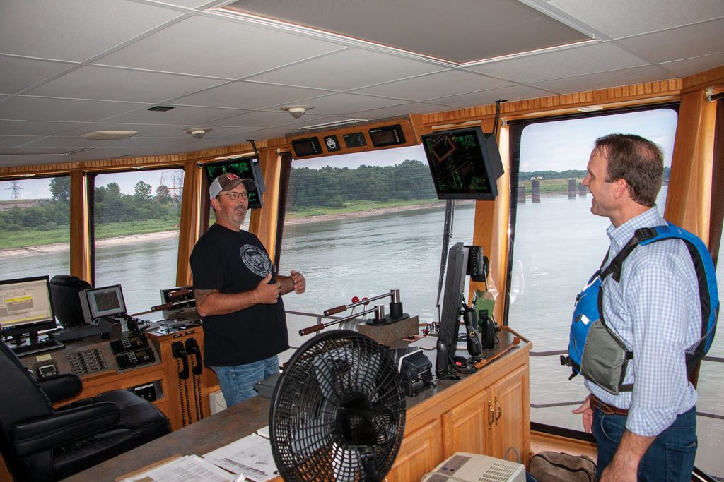 Capt. Ronnie Hughes, relief captain on the ACBL mv. Mike Weisend, with Patrick Sutton, chief operating officer of ACBL. (Photo by John Shoulberg)
