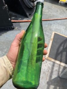 Bottle found by Big River Shipbuilding crew salvaging a dredge float in the Yazoo River Diversion Canal. (Photo by Billy Mitchell)