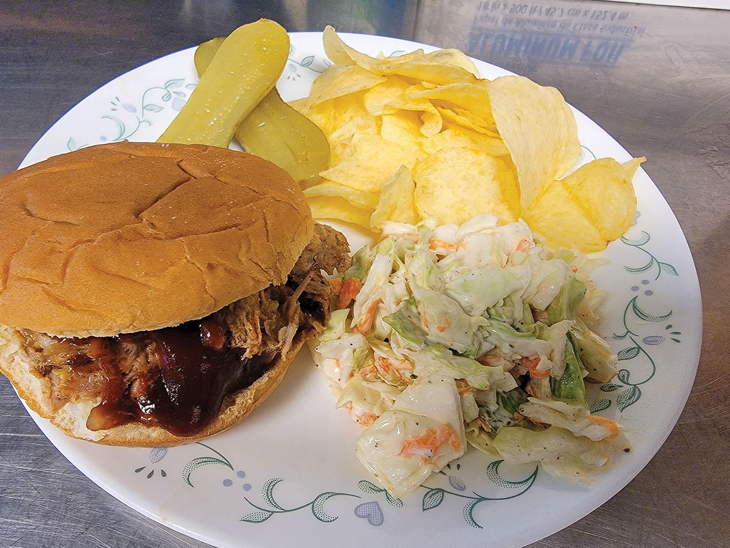 Pulled pork sandwich with coleslaw.